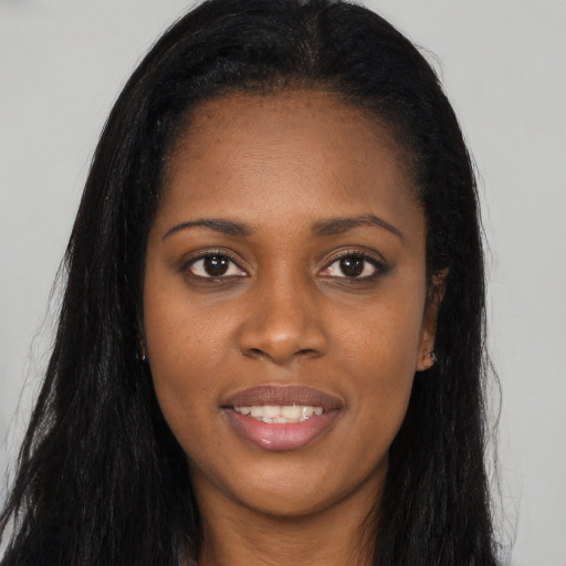 Joyful asian young-adult female with long  black hair and brown eyes