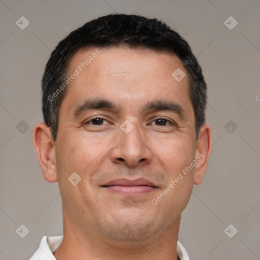 Joyful white adult male with short  brown hair and brown eyes