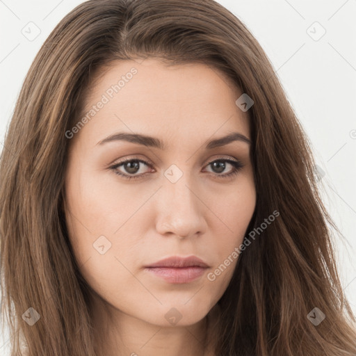 Neutral white young-adult female with long  brown hair and brown eyes