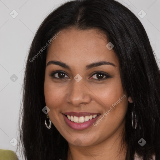 Joyful latino young-adult female with long  brown hair and brown eyes