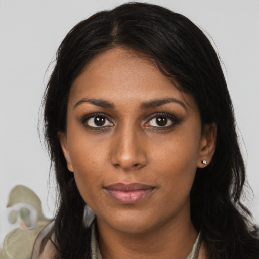Neutral latino young-adult female with long  brown hair and brown eyes