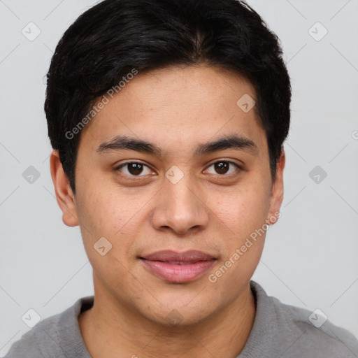 Joyful asian young-adult male with short  brown hair and brown eyes