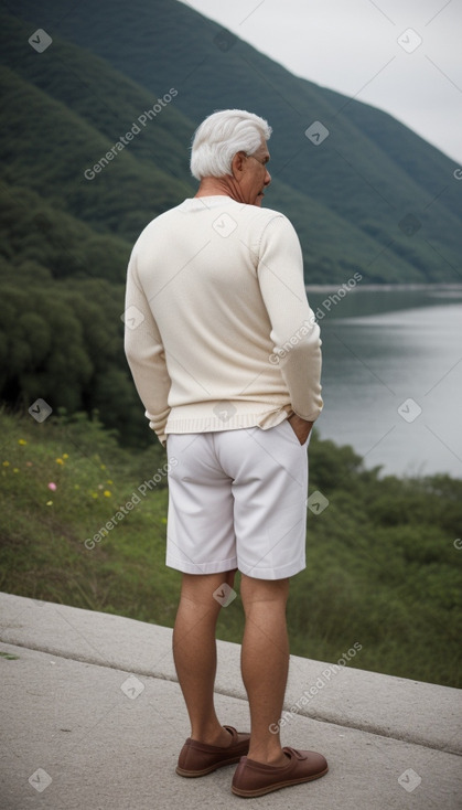 Venezuelan middle-aged male with  white hair