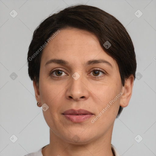 Joyful white adult female with short  brown hair and brown eyes