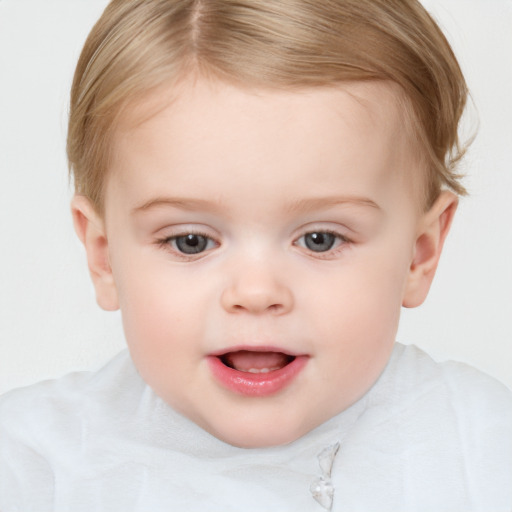 Joyful white child female with short  brown hair and brown eyes