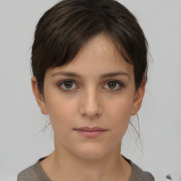 Neutral white young-adult female with short  brown hair and brown eyes