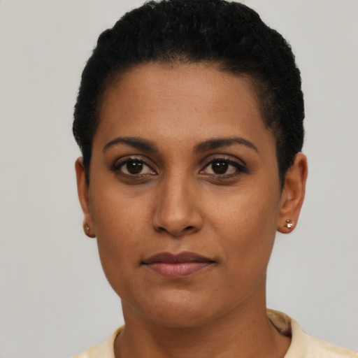 Neutral latino young-adult female with short  brown hair and brown eyes