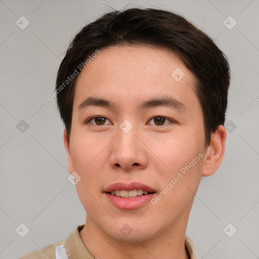 Joyful asian young-adult male with short  brown hair and brown eyes