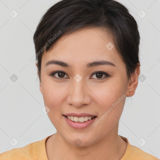 Joyful asian young-adult female with short  brown hair and brown eyes