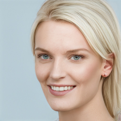 Joyful white young-adult female with long  brown hair and blue eyes