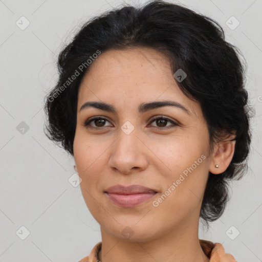 Joyful latino young-adult female with medium  brown hair and brown eyes