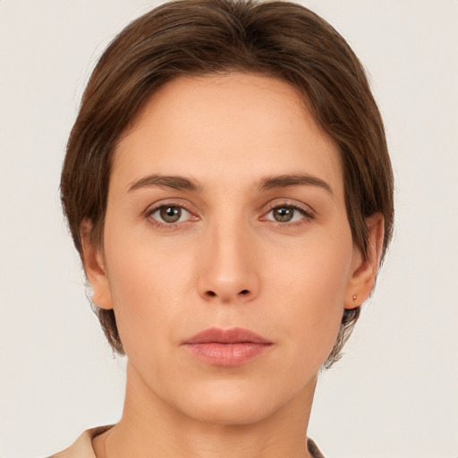 Neutral white young-adult female with medium  brown hair and brown eyes