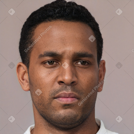 Neutral black young-adult male with short  black hair and brown eyes