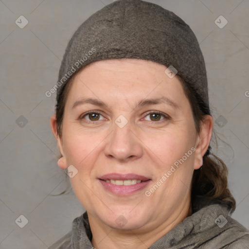 Joyful white adult female with short  brown hair and brown eyes