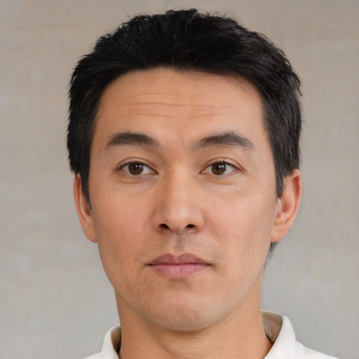 Neutral asian young-adult male with short  black hair and brown eyes