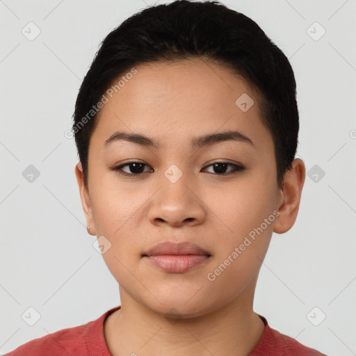 Joyful latino young-adult female with short  black hair and brown eyes