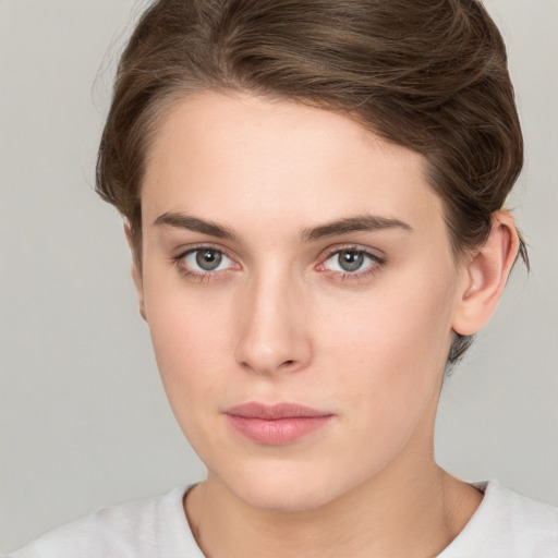 Neutral white young-adult female with medium  brown hair and brown eyes