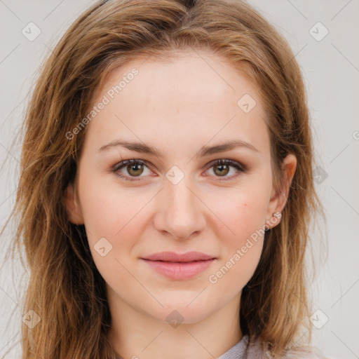 Joyful white young-adult female with long  brown hair and green eyes