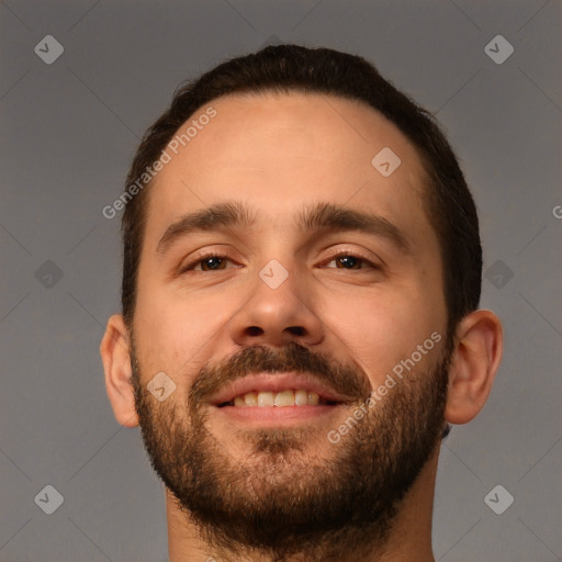 Joyful white young-adult male with short  brown hair and brown eyes