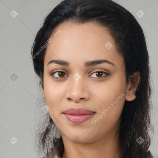 Joyful latino young-adult female with long  black hair and brown eyes