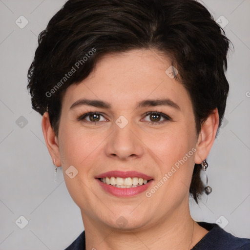 Joyful white young-adult female with short  brown hair and grey eyes