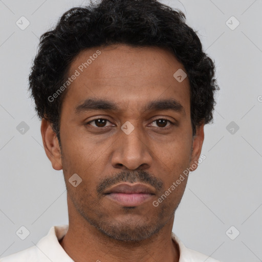 Neutral latino young-adult male with short  brown hair and brown eyes