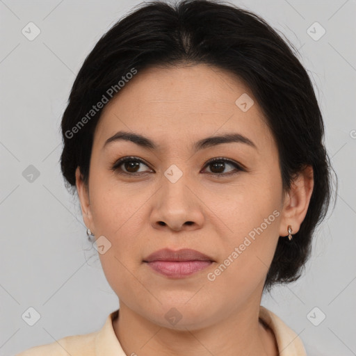 Joyful asian young-adult female with medium  brown hair and brown eyes