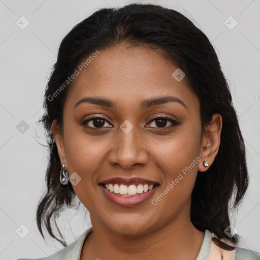 Joyful latino young-adult female with medium  brown hair and brown eyes