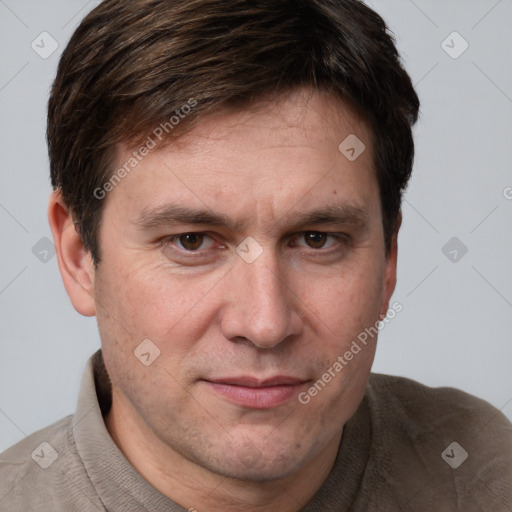 Joyful white adult male with short  brown hair and grey eyes