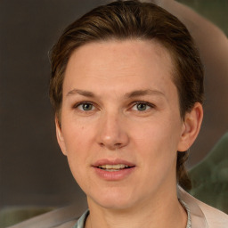 Joyful white adult female with short  brown hair and grey eyes