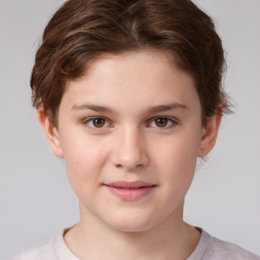 Joyful white child female with short  brown hair and brown eyes