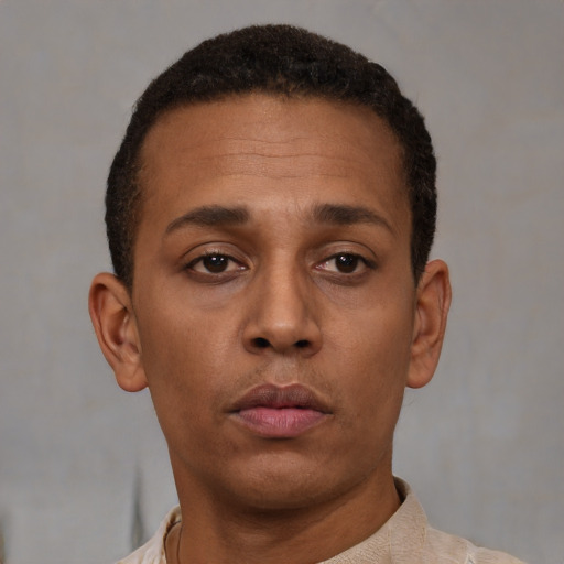 Neutral latino adult male with short  brown hair and brown eyes