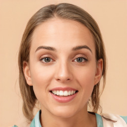 Joyful white young-adult female with medium  brown hair and blue eyes