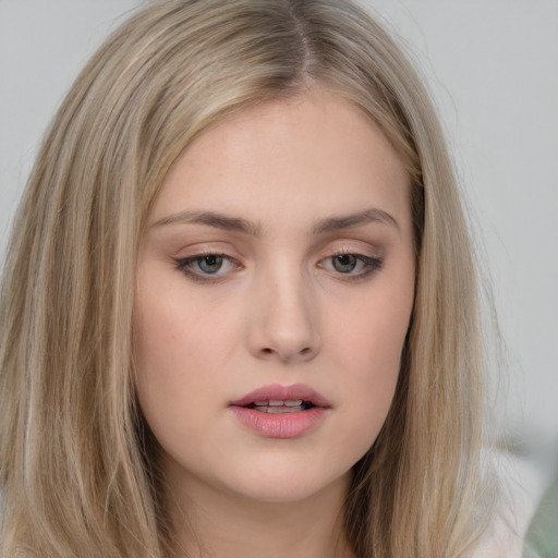 Neutral white young-adult female with long  brown hair and brown eyes