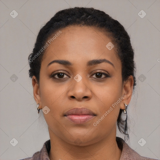 Joyful black young-adult female with medium  black hair and brown eyes