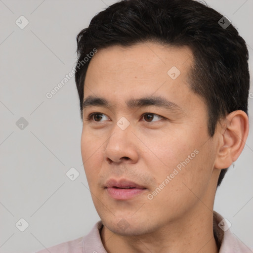 Neutral asian young-adult male with short  black hair and brown eyes