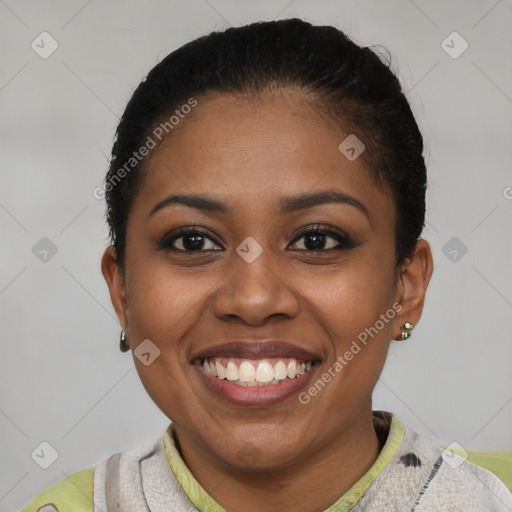 Joyful black young-adult female with short  brown hair and brown eyes