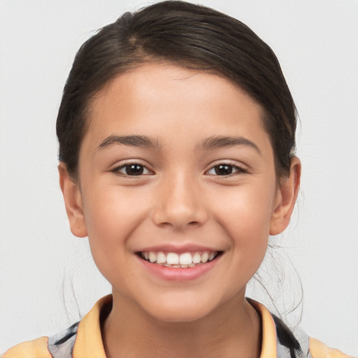 Joyful white child female with short  brown hair and brown eyes