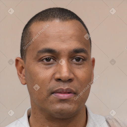 Neutral latino young-adult male with short  brown hair and brown eyes