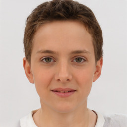 Joyful white child female with short  brown hair and brown eyes