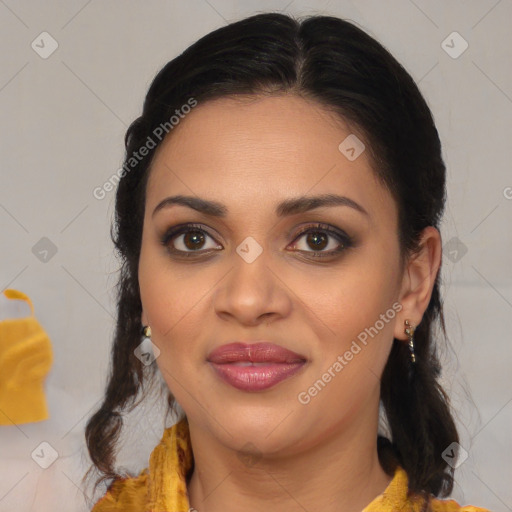 Joyful latino young-adult female with medium  brown hair and brown eyes