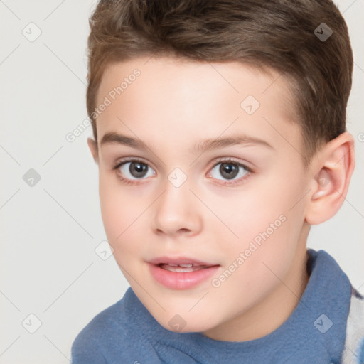 Joyful white child male with short  brown hair and brown eyes