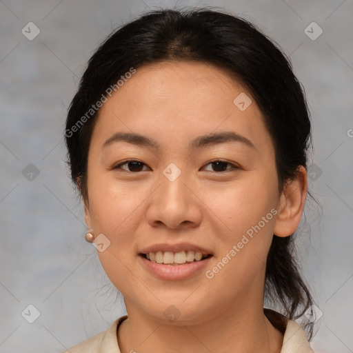 Joyful asian young-adult female with medium  brown hair and brown eyes