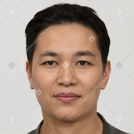 Joyful white young-adult male with short  black hair and brown eyes