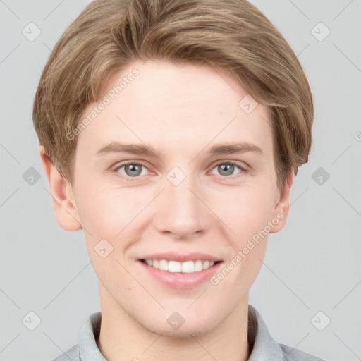 Joyful white young-adult female with short  brown hair and grey eyes