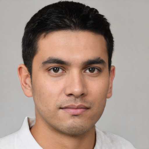 Neutral white young-adult male with short  black hair and brown eyes