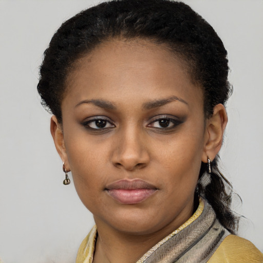 Neutral black young-adult female with short  brown hair and brown eyes