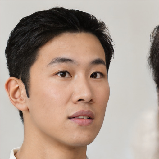 Neutral asian young-adult male with short  black hair and brown eyes