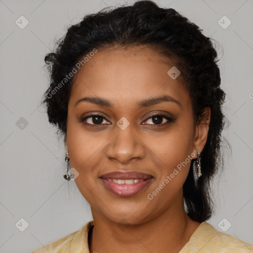 Joyful black young-adult female with long  brown hair and brown eyes