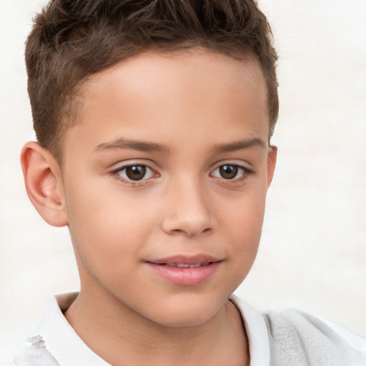 Joyful white child male with short  brown hair and brown eyes